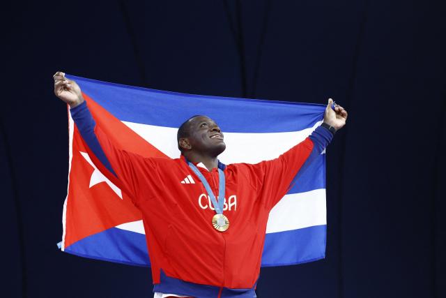 five-time Olympic champion, the Cuban colossus Mijain Lopez in the legend (Wrestling)